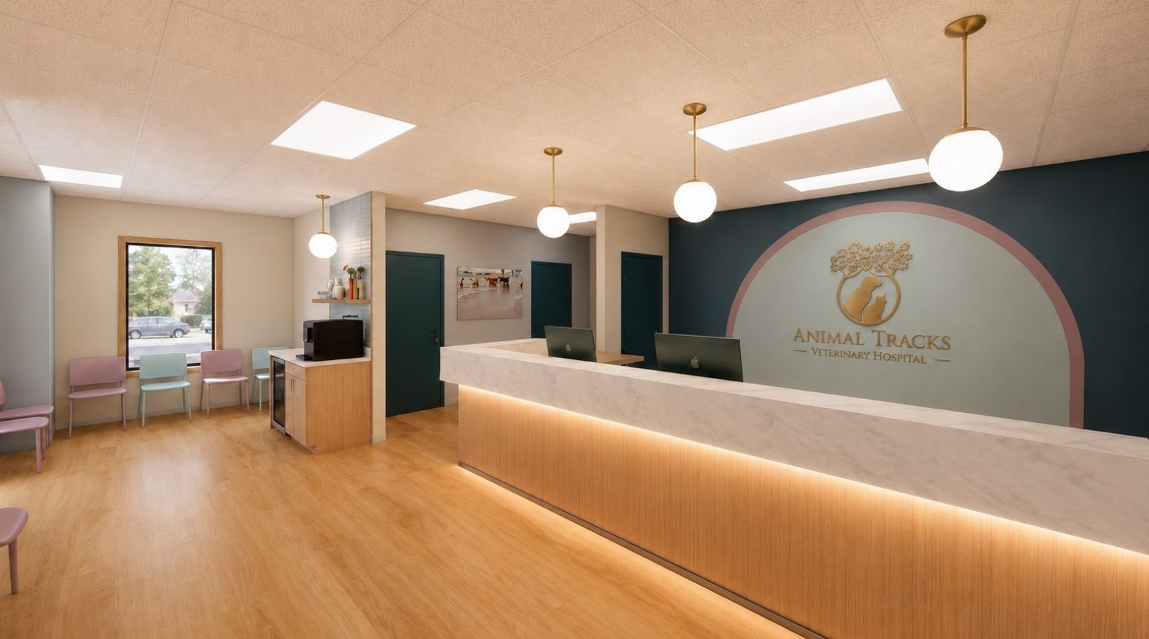 Reception area of an animal hospital with a long marble counter, seating area, and round ceiling lights.